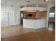 Open kitchen with stainless steel appliances and a view to dining area at 508 Royal Tree Ln, Oviedo, FL 32765
