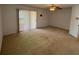 Living room with carpet, ceiling fan and sliding door to deck/patio at 508 Royal Tree Ln, Oviedo, FL 32765