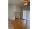 Living area with wood floors and view to the pool at 508 Royal Tree Ln, Oviedo, FL 32765