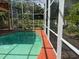 Outdoor, screened-in swimming pool area surrounded by trees and plants at 508 Royal Tree Ln, Oviedo, FL 32765