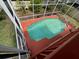 Screened in pool features a painted pool deck and trees beyond the pool screen at 508 Royal Tree Ln, Oviedo, FL 32765