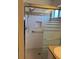 Shower with a safety bar and horizontally striped glass doors at 508 Royal Tree Ln, Oviedo, FL 32765