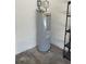 Grey water heater tank with attached equipment at 508 Royal Tree Ln, Oviedo, FL 32765