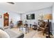 Comfortable living room featuring two accent chairs and glass coffee table at 5113 Sage Way, Kissimmee, FL 34758