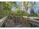 Scenic elevated wooden walkway winds through lush greenery near the apartments at 5300 S Atlantic Ave # 16-505, New Smyrna Beach, FL 32169