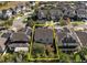 Aerial view of a home on a tree lined street at 540 Seven Oaks Blvd, Winter Springs, FL 32708