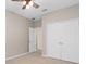 Clean bedroom with double door closet and neutral color scheme at 540 Seven Oaks Blvd, Winter Springs, FL 32708
