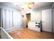 Bedroom featuring wood floors, neutral walls, ceiling fan, and dresser at 613 Casa Park Court B N Ct # B, Winter Springs, FL 32708