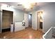Bedroom with hardwood flooring, ceiling fan, closet, and an en-suite bathroom at 613 Casa Park Court B N Ct # B, Winter Springs, FL 32708