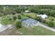 Aerial view of house with a screened-in pool area at 7017 Bridle Path, St Cloud, FL 34771