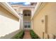 Inviting walkway with garden beds leading to the front of the house at 8539 Via Bella Notte, Orlando, FL 32836