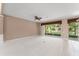 Spacious living room features plush carpeting and sliding glass doors at 8539 Via Bella Notte, Orlando, FL 32836