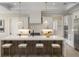 Well-lit kitchen features a spacious island, pendant lights, and stainless steel appliances at 9155 Sheen Sound St, Orlando, FL 32836
