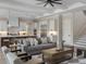 Spacious living room featuring a modern ceiling fan, gray sofa, and open layout at 9155 Sheen Sound St, Orlando, FL 32836