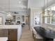 Open floorplan showcasing kitchen, dining, and living areas with modern finishes at 9155 Sheen Sound St, Orlando, FL 32836