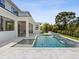 Beautiful backyard pool area with modern design elements and ample space for relaxation and recreation at 9155 Sheen Sound St, Orlando, FL 32836