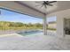 Inviting outdoor pool area overlooking lush greenery, offering a perfect blend of relaxation and recreation at 9155 Sheen Sound St, Orlando, FL 32836