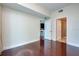 Well-lit bedroom featuring hardwood floors and neutral walls, perfect for relaxation at 101 S Eola Dr # 621, Orlando, FL 32801