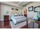 Cozy bedroom with a well-decorated bed, and wood floors at 101 S Eola Dr # 621, Orlando, FL 32801