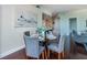 Open dining area with modern decor and seating for four, connecting to other living spaces at 101 S Eola Dr # 621, Orlando, FL 32801