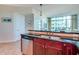 Modern kitchen featuring stainless steel appliances, granite countertops, and breakfast bar at 101 S Eola Dr # 621, Orlando, FL 32801