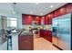 Well-equipped kitchen with stainless steel appliances, ample cabinetry, and breakfast bar at 101 S Eola Dr # 621, Orlando, FL 32801
