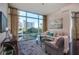 Bright living room with a large window providing natural light and scenic city views at 101 S Eola Dr # 621, Orlando, FL 32801