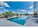 Rooftop pool and deck with plenty of seating and beautiful clear blue sky in the background at 101 S Eola Dr # 621, Orlando, FL 32801