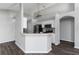 A view of the kitchen with modern stainless steel appliances and stylish pendant lighting at 1175 Seasons Blvd, Kissimmee, FL 34746