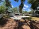 Backyard featuring a patio, in-ground pool, and spacious yard at 1329 Se 36Th Ave, Ocala, FL 34471