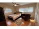 Bedroom with hardwood floors and a decorative rug at 1329 Se 36Th Ave, Ocala, FL 34471