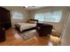 Cozy bedroom with hardwood floors, large windows, and comfortable seating at 1329 Se 36Th Ave, Ocala, FL 34471