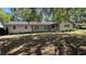 Inviting one-story home with shuttered windows and a cozy front porch at 1329 Se 36Th Ave, Ocala, FL 34471