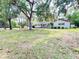 Charming one-story home with mature trees and a spacious front yard at 1329 Se 36Th Ave, Ocala, FL 34471