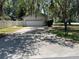 Detached two-car garage and a private driveway at 1329 Se 36Th Ave, Ocala, FL 34471
