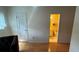 Cozy living area with a bathroom view and sleek hardwood floors at 1329 Se 36Th Ave, Ocala, FL 34471