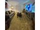 Cozy living room featuring a plush sofa, television, and neutral decor at 1329 Se 36Th Ave, Ocala, FL 34471