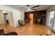 Bright and open living room with hardwood floors, built-in shelving, and lots of natural light at 1329 Se 36Th Ave, Ocala, FL 34471