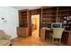 Home office with custom built-in shelves and desk at 1329 Se 36Th Ave, Ocala, FL 34471