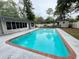 Backyard showcasing a sparkling in-ground pool, perfect for summer relaxation at 1329 Se 36Th Ave, Ocala, FL 34471