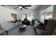 Inviting sun room with lots of natural light, bar and seating area at 1329 Se 36Th Ave, Ocala, FL 34471