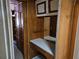 Bathroom vanity with built-in storage and vanity lighting at 1424 Lake Shore Dr, Casselberry, FL 32707