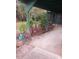 Spacious carport with room for parking and complemented by verdant greenery for curb appeal at 1424 Lake Shore Dr, Casselberry, FL 32707