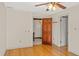 Bedroom featuring hardwood floors, neutral walls, and a ceiling fan at 1742 Barcelona Way, Winter Park, FL 32789