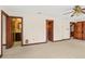 Spacious bedroom with a ceiling fan and wood-trimmed doorways leading to other rooms at 1742 Barcelona Way, Winter Park, FL 32789