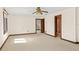 Bedroom with neutral colored carpet, two doorways, and neutral colored walls at 1742 Barcelona Way, Winter Park, FL 32789