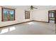 Bedroom with two windows bringing in natural light and neutral colored carpet at 1742 Barcelona Way, Winter Park, FL 32789