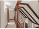 Hallway with wooden beam architecture and a decorative chandelier hanging from the ceiling at 1742 Barcelona Way, Winter Park, FL 32789