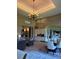 Multiple open concept rooms, including the living room, dining area, and kitchen at 1802 Hartford Path, The Villages, FL 32162