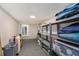 Unfinished basement area with storage shelves and visible utilities, ideal for customization and organization at 1831 Mizell Ave, Winter Park, FL 32789